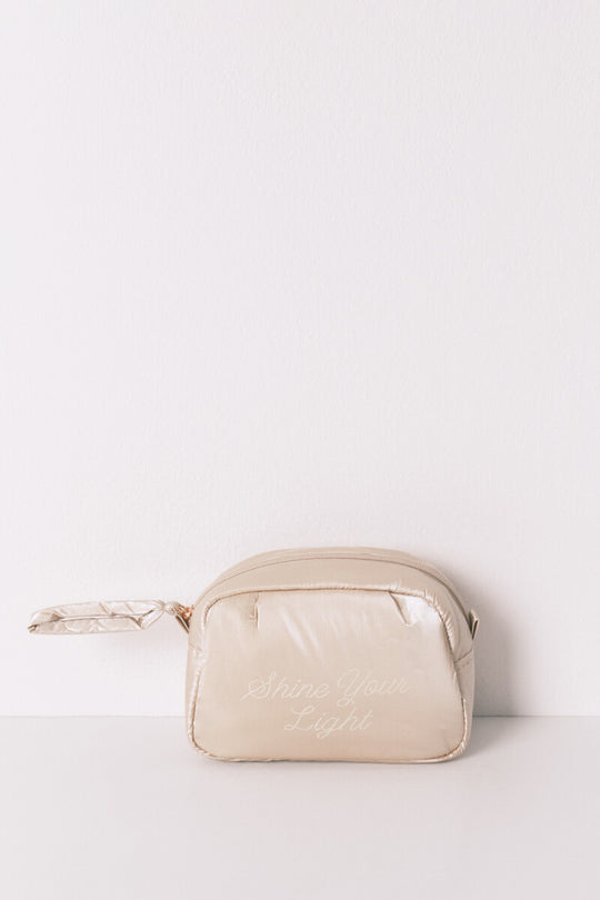 Small pink satin-finish puffer vanity case