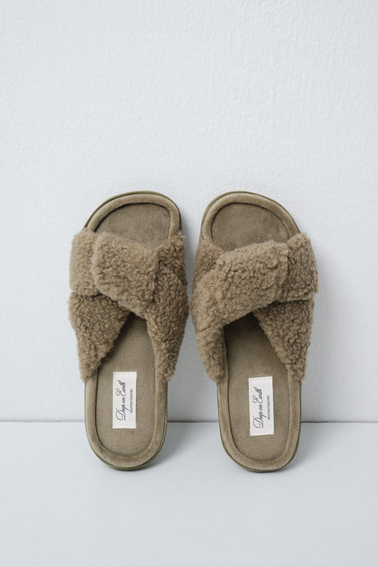 Green faux shearling knot slippers